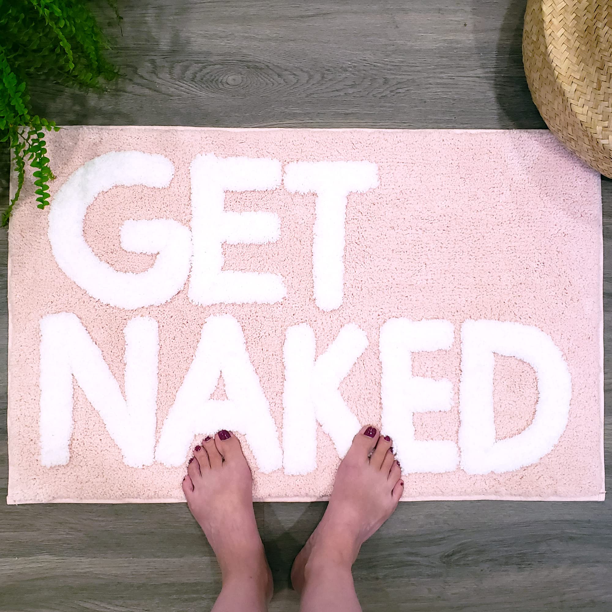 New Mungo Get Naked bath mat pink non-slip backing visible for safety.
