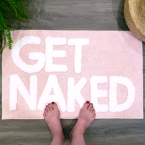 New Mungo Get Naked bath mat pink non-slip backing visible for safety.