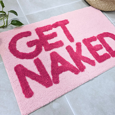 New Mungo Get Naked pink bath mat measures 31 by 20 inches.
