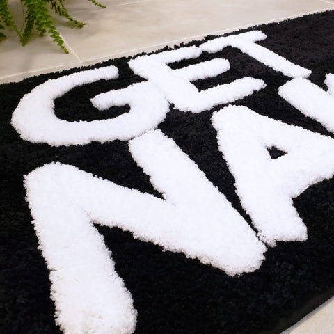 New Mungo Get Naked 31-by-20-inch rug fits compact bathrooms.