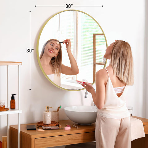 NEWBULIG gold round wall mirror 30-inch over-sink view highlights bathroom lighting.