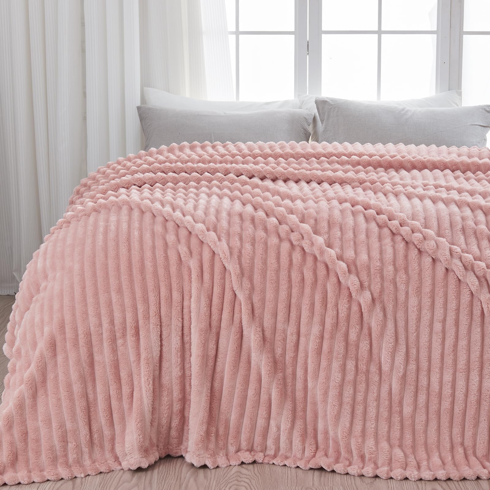 NEWCOSPLAY pink 3D jacquard blanket highlights elegant warmth on chilly evenings