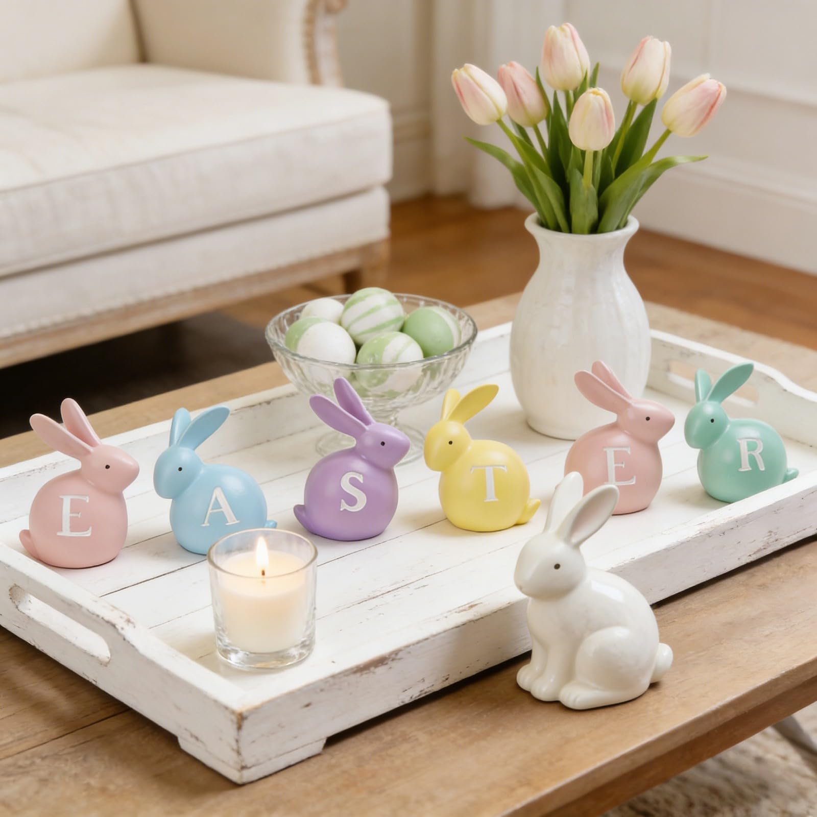 Newman House Studio Easter bunny centerpieces for table setup with six colorful hand-painted figurines.