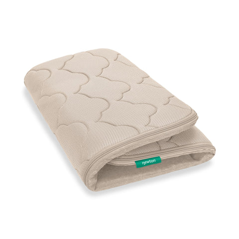 Newton Baby Bassinet Cover Sandstone helps keep the sleep space clean between washes.