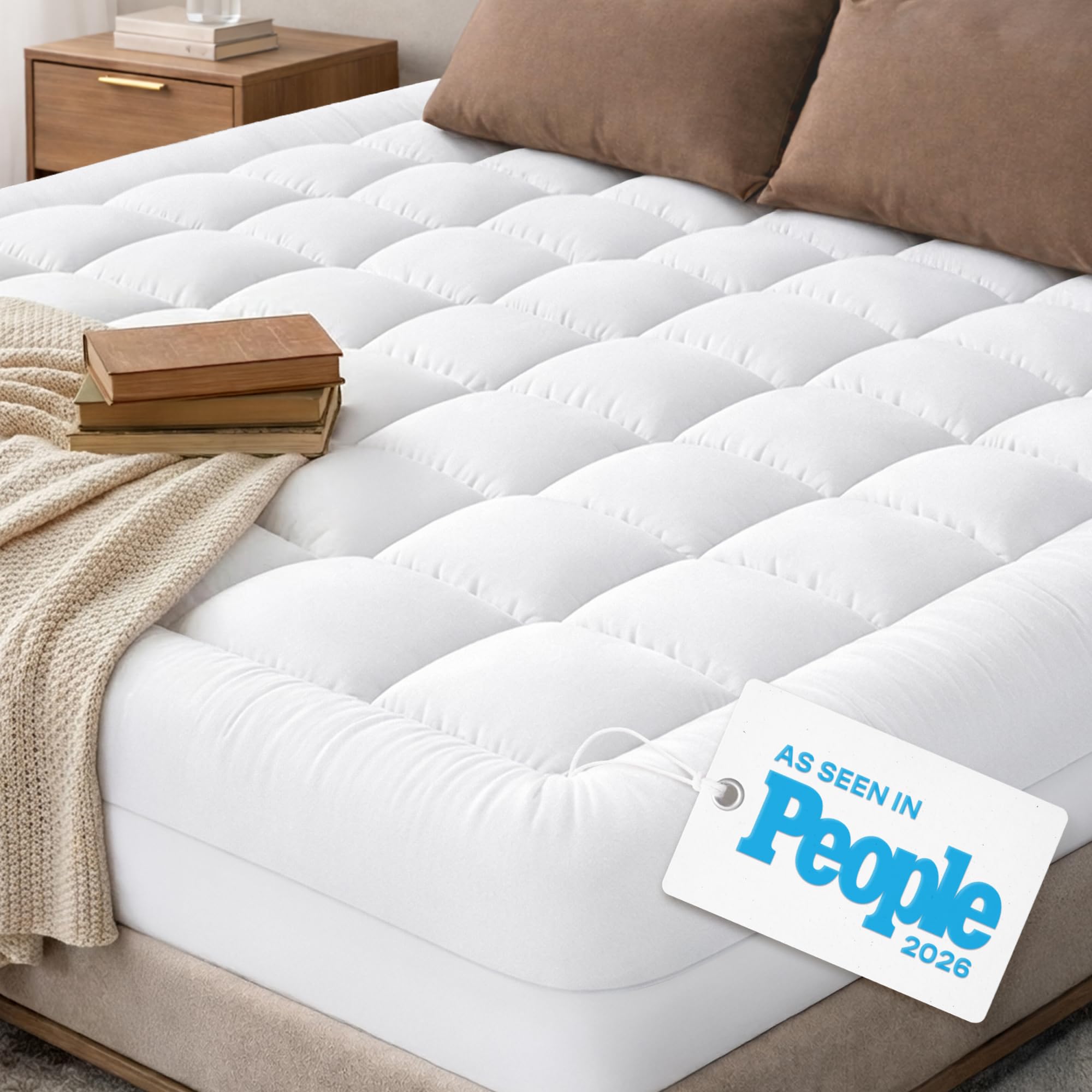 Niagara Sleep Solution cloud-like twin XL topper on a bed for plush comfort.