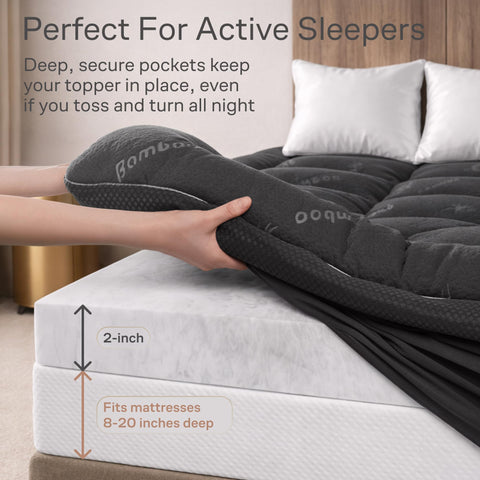 Niagara Sleep Solution dark gray topper on a bed blends with decor.