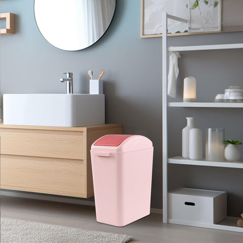 Nicesh pink trash can on a countertop, clean and tidy in seconds.