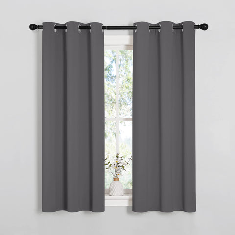 NICETOWN bedroom curtains silver grommet installation demonstrating simple hanging and privacy.