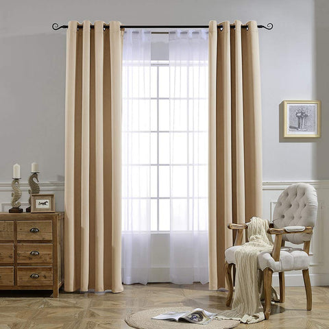 NICETOWN Biscotti Beige blackout curtains installed in a cozy bedroom setup