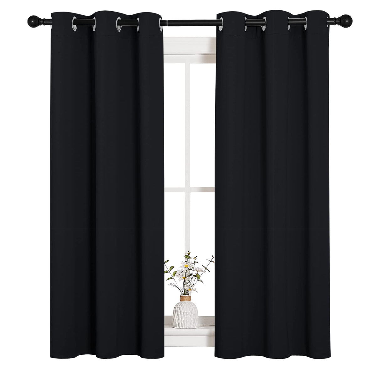 NICETOWN blackout curtains 2-panel 34x54 in black with silver grommets for smooth sliding and privacy.