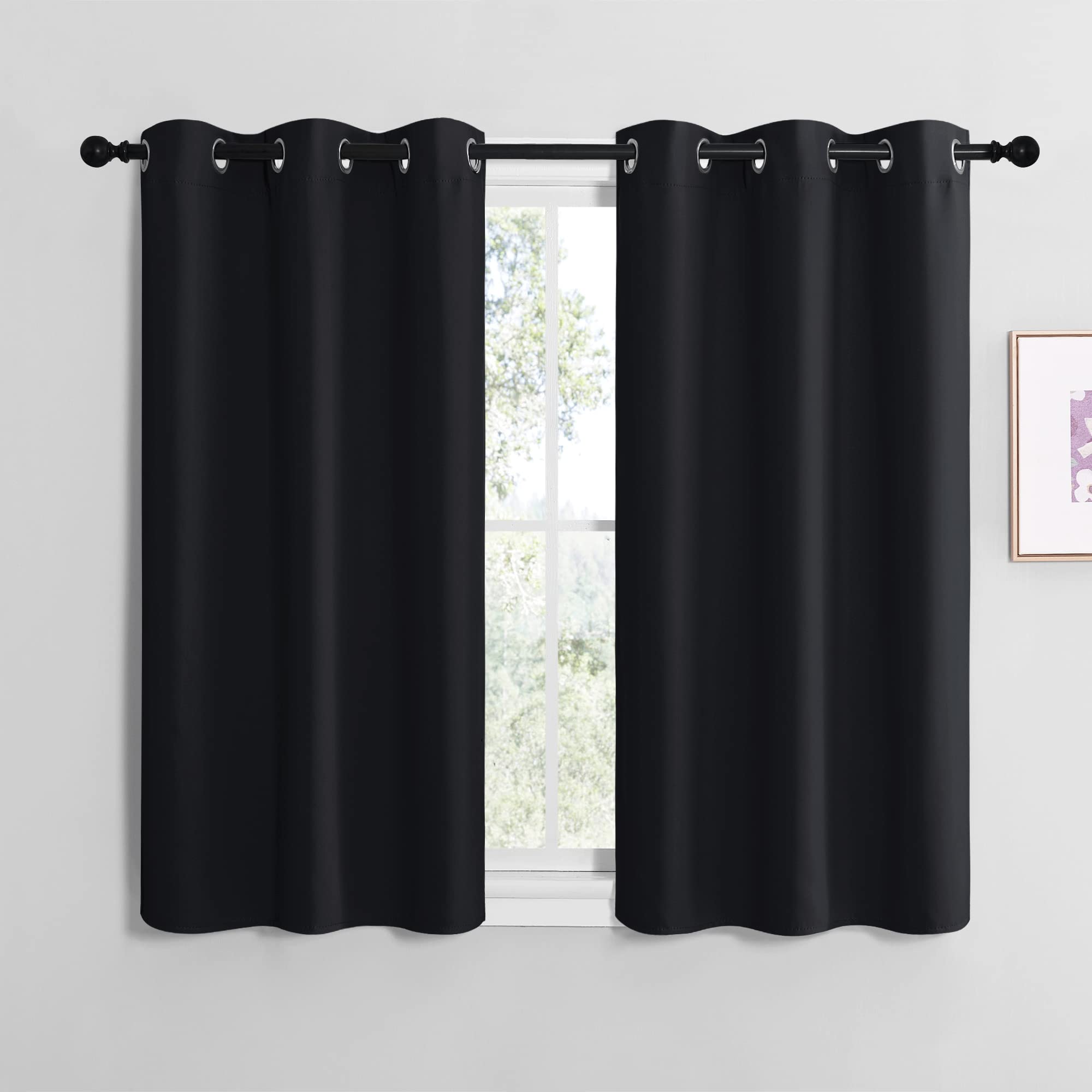 NICETOWN blackout curtains 2-panel installation for smooth sliding and darkening.