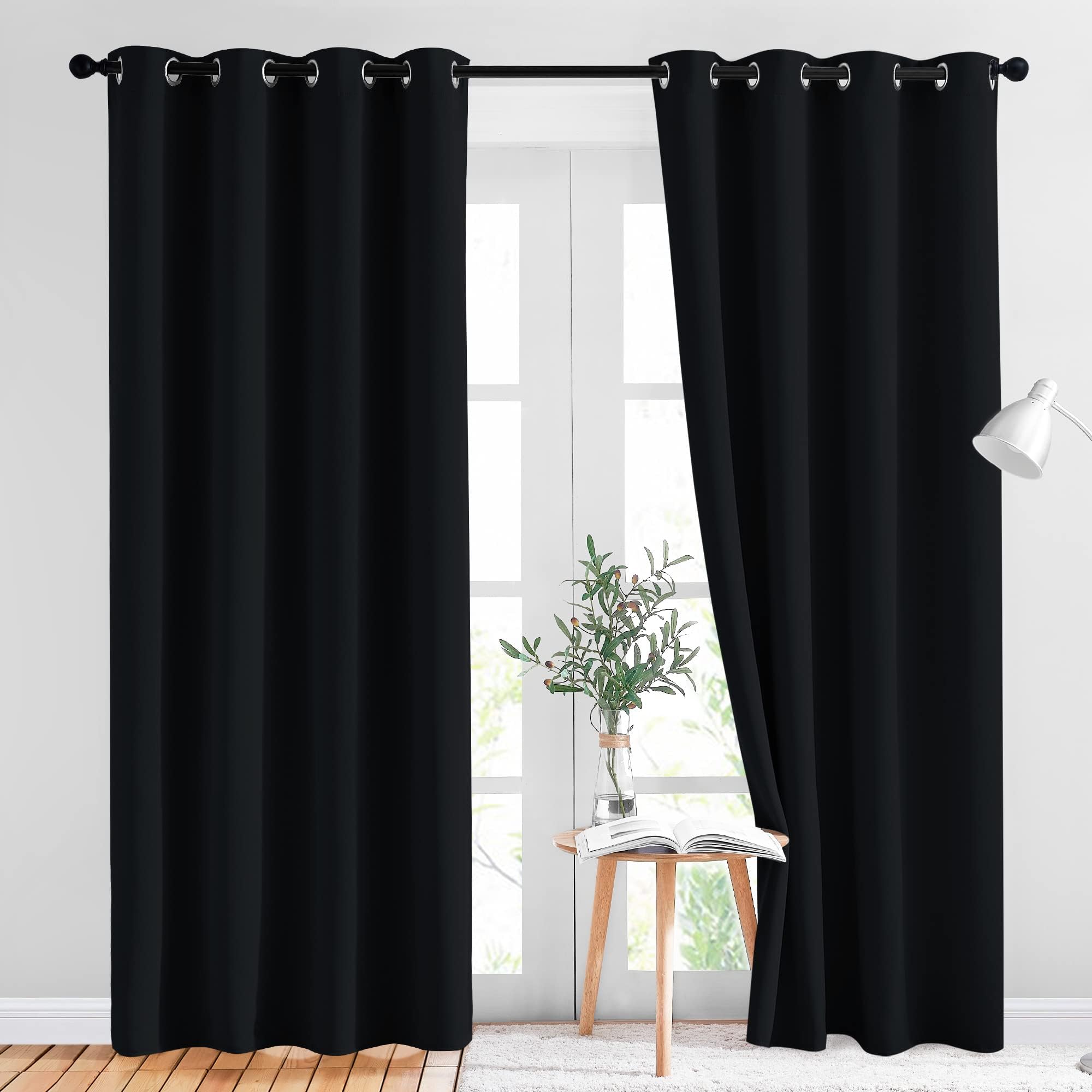 NICETOWN blackout curtains panel with silver grommets, easy to hang.