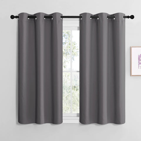 NICETOWN blackout curtains two-panel setup with grommets for easy installation and light control.