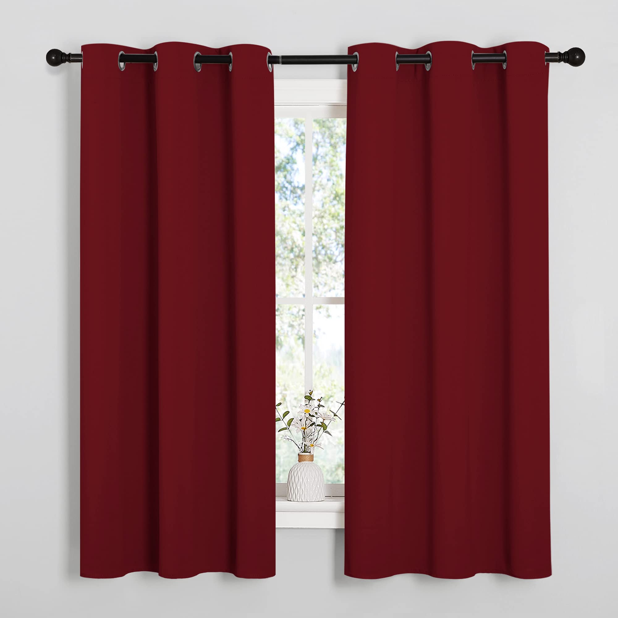 NICETOWN burgundy blackout curtains with 6 grommets for easy hanging and privacy.