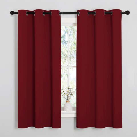 NICETOWN burgundy blackout curtains with 6 grommets for easy hanging and privacy.