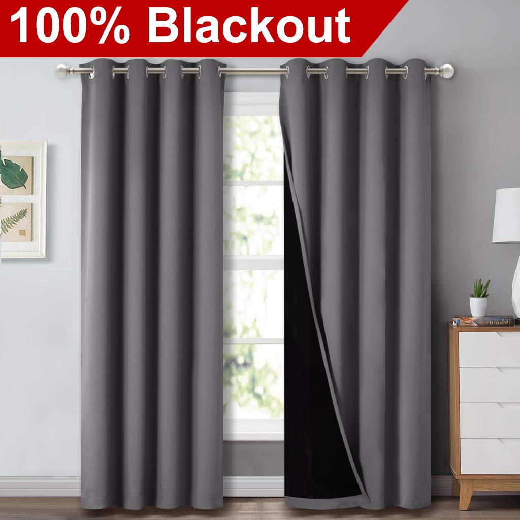 NICETOWN grey full shade curtain with silver grommets for easy sliding and contemporary style.