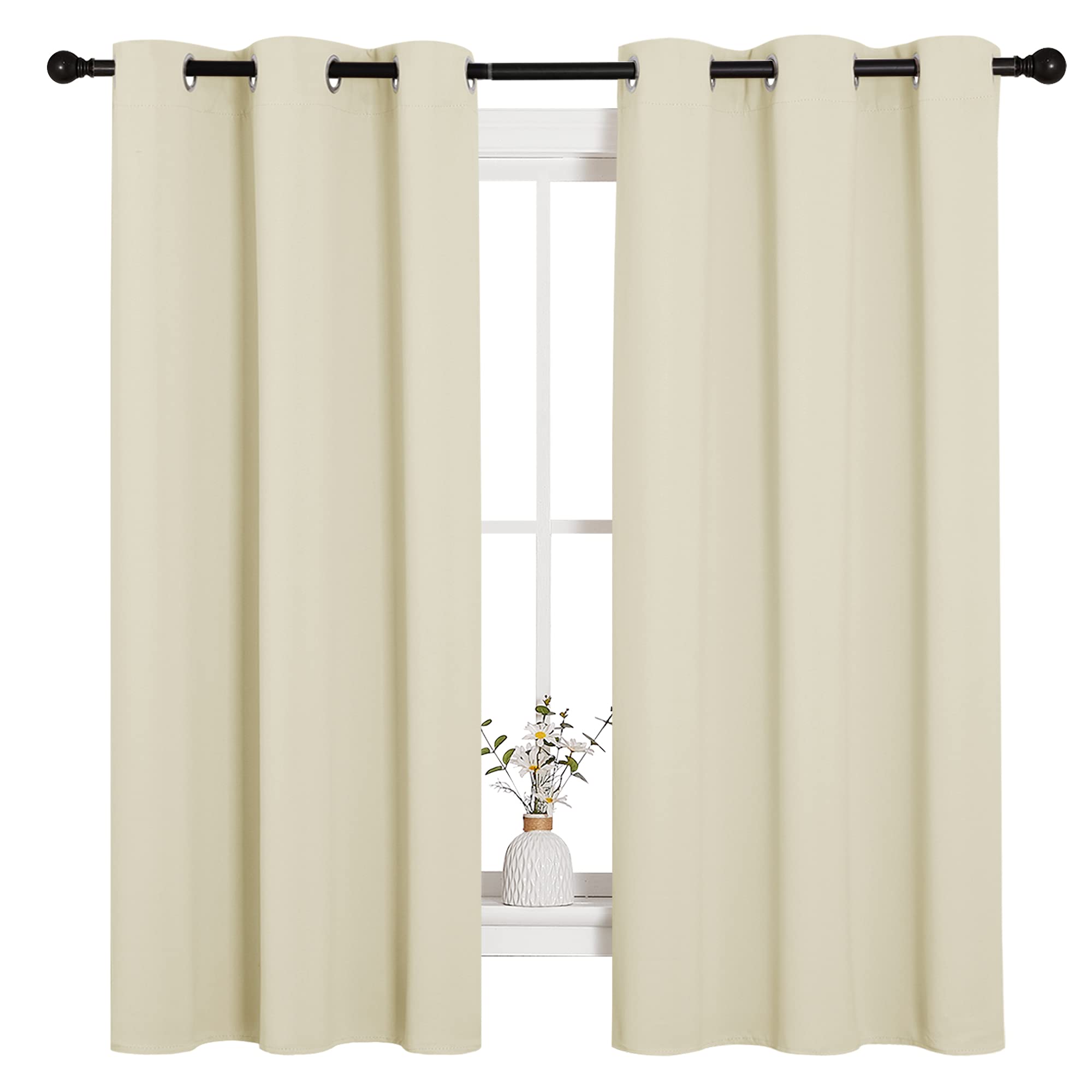 NICETOWN beige blackout drapes in room view, blocks light and glare.