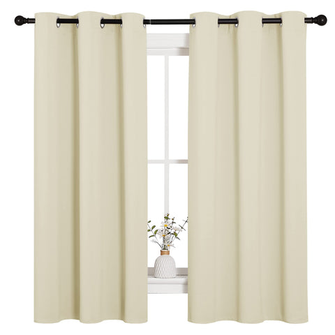 NICETOWN beige blackout drapes in room view, blocks light and glare.
