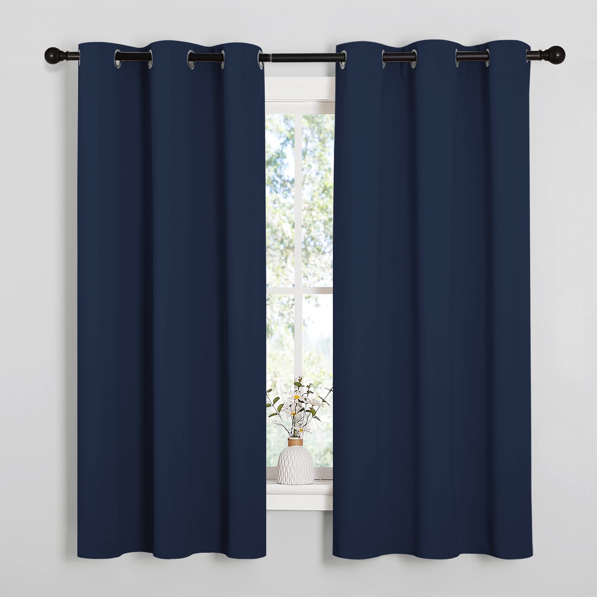 NICETOWN navy blackout curtain panel 1 showing dense fabric for light control