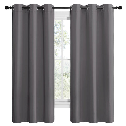 NICETOWN silver grommet top blackout curtain ready for easy sliding.