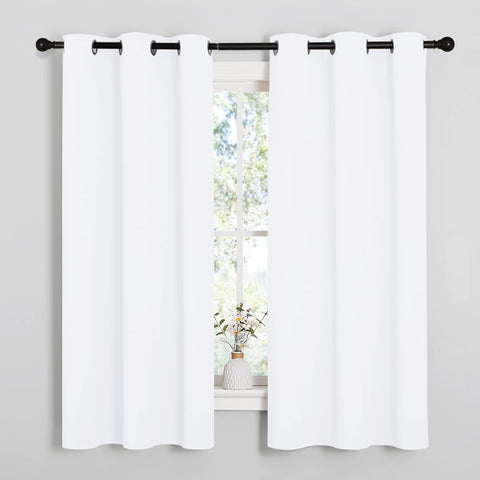 NICETOWN white curtain close-up with silver grommets for smooth sliding.
