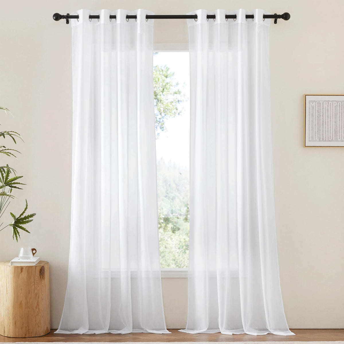 NICETOWN white sheer curtain pair 54w-102l lets soft daylight in while framing your view.