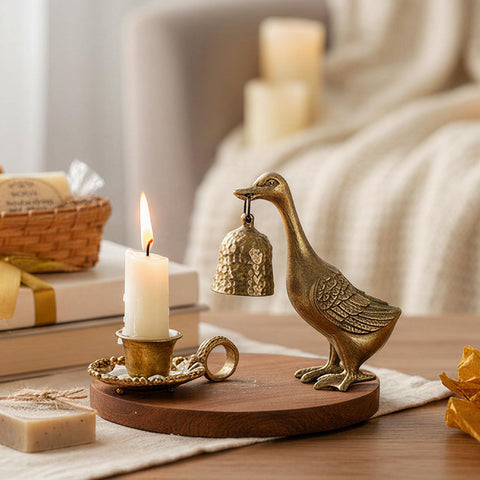 NIKKY HOME Gold Candle Snuffer goose design elevates table ambiance