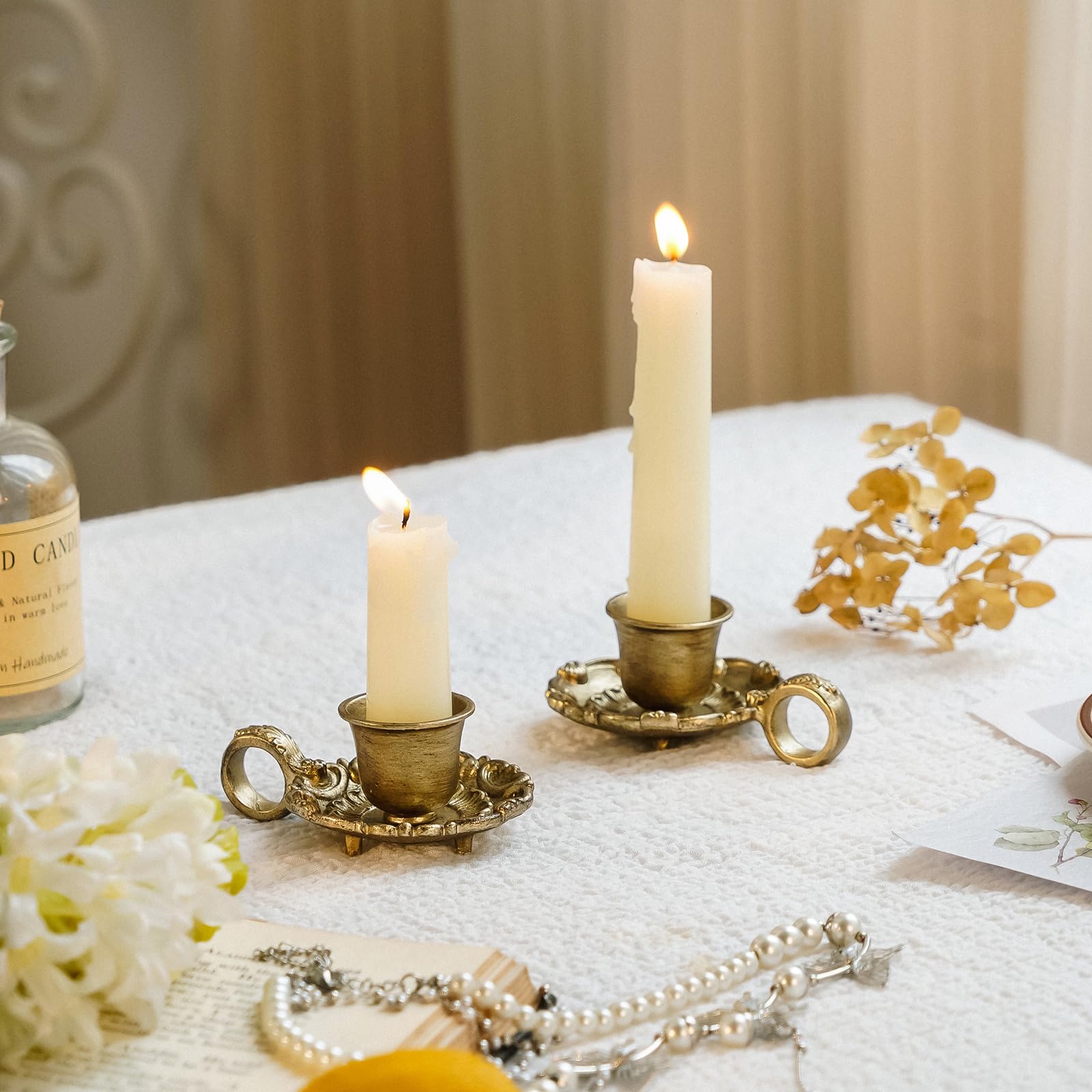 NIKKY HOME gold taper candle holder front view, stylish mantel display.