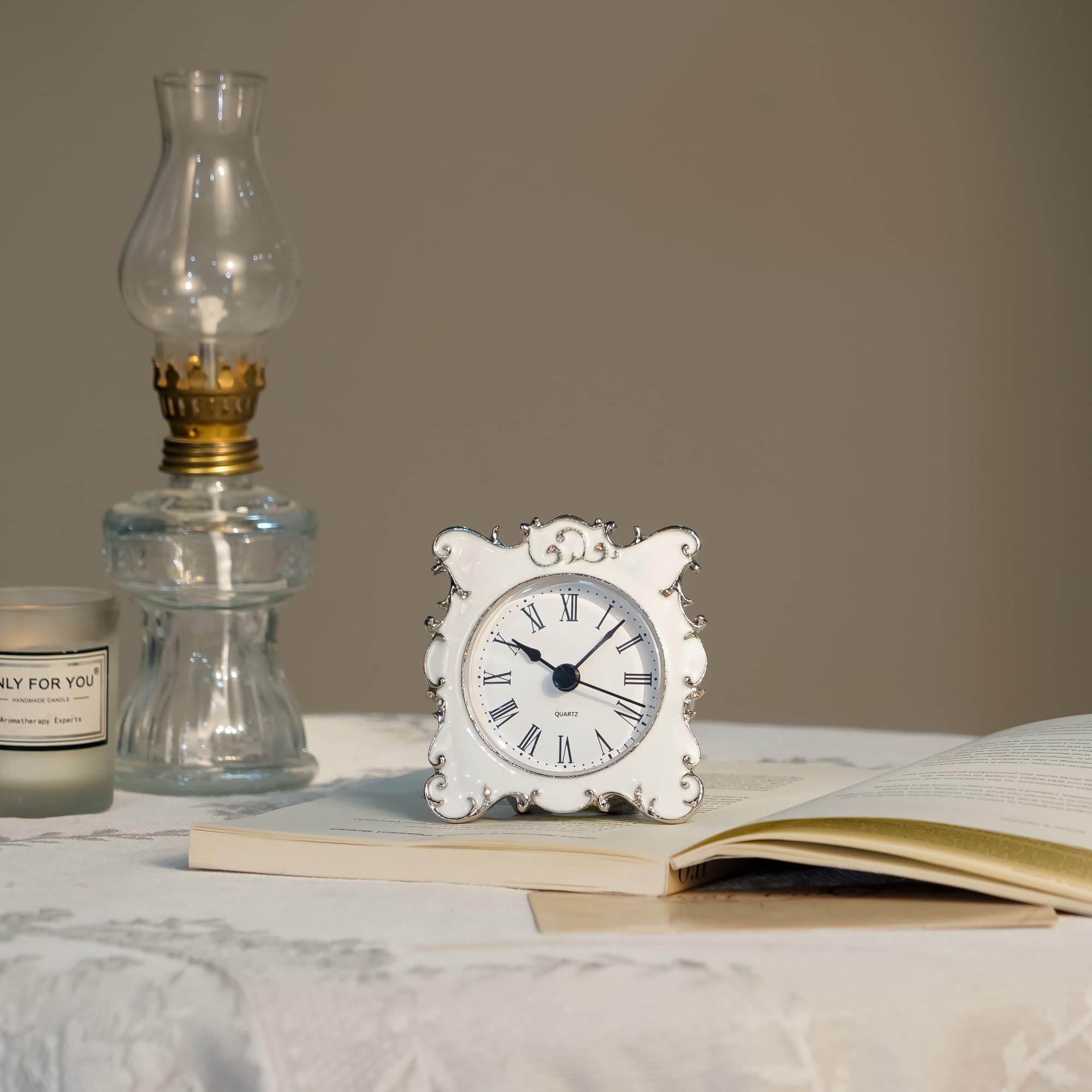 NIKKY HOME clock border closeup highlights white rhinestones and elegance.