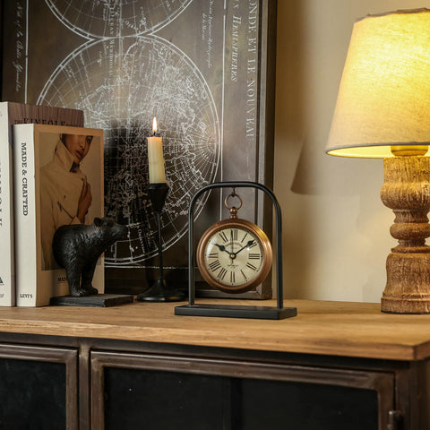 NIKKY HOME clock face close-up with clear Roman numerals.