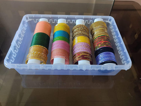 NMII bangle storage box with removable rods keeps bracelets organized and protected while traveling.