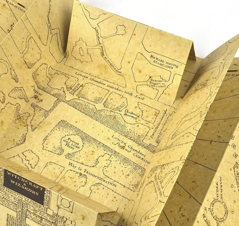 The Noble Collection Marauder's Map folded form supports compact storage.