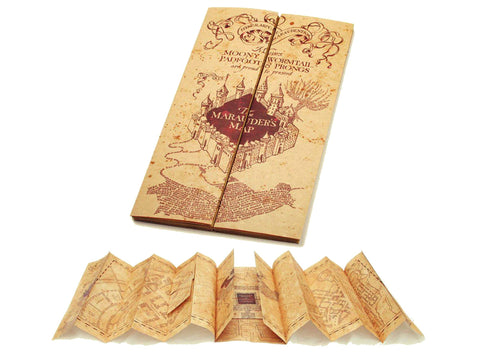 The Noble Collection Marauder's Map parchment close-up highlights aged ink lines.