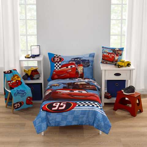 NoJo Disney Cars Radiator Springs comforter adds colorful storytelling to a toddler bed.