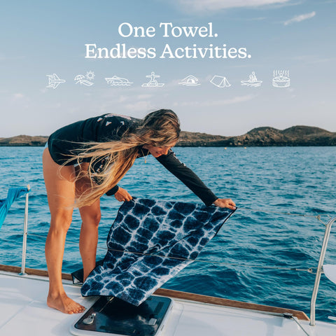 Nomadix Original Towel rolled compactly for easy travel packing.