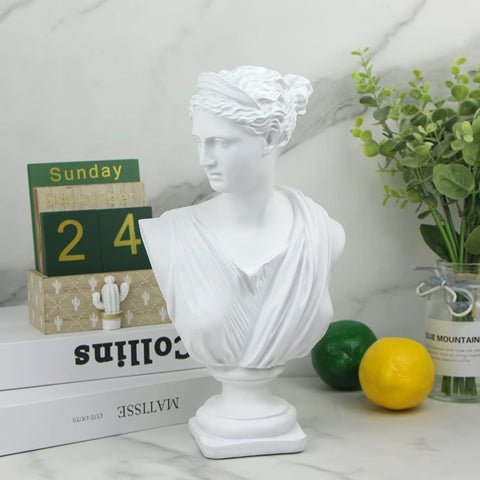 Norrclp Diana statue in a living room setup, stylish focal point.