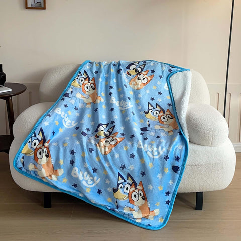 Northwest Bluey silk touch sherpa throw with fringed edges adds subtle style to any room.