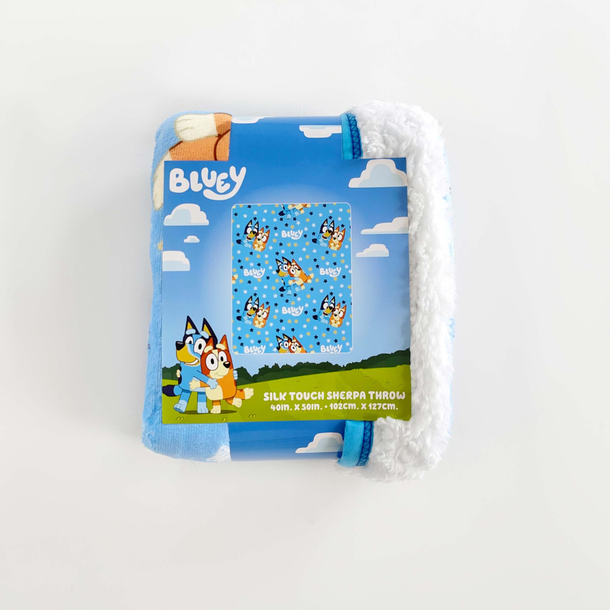 Northwest Bluey silk touch sherpa throw blanket's soft polyester feels luxurious and warm.