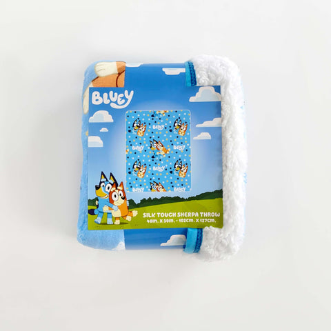 Northwest Bluey silk touch sherpa throw blanket's soft polyester feels luxurious and warm.