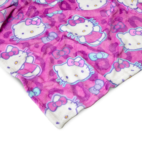 Northwest Hello Kitty tie-dye detail highlights vibrant color for playful spaces.
