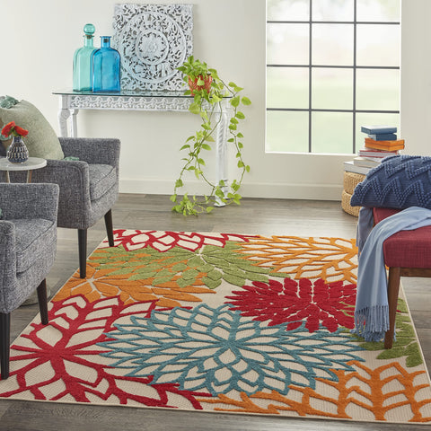 Nourison Aloha vibrant color bursts in orange, red, and green for festive accents.