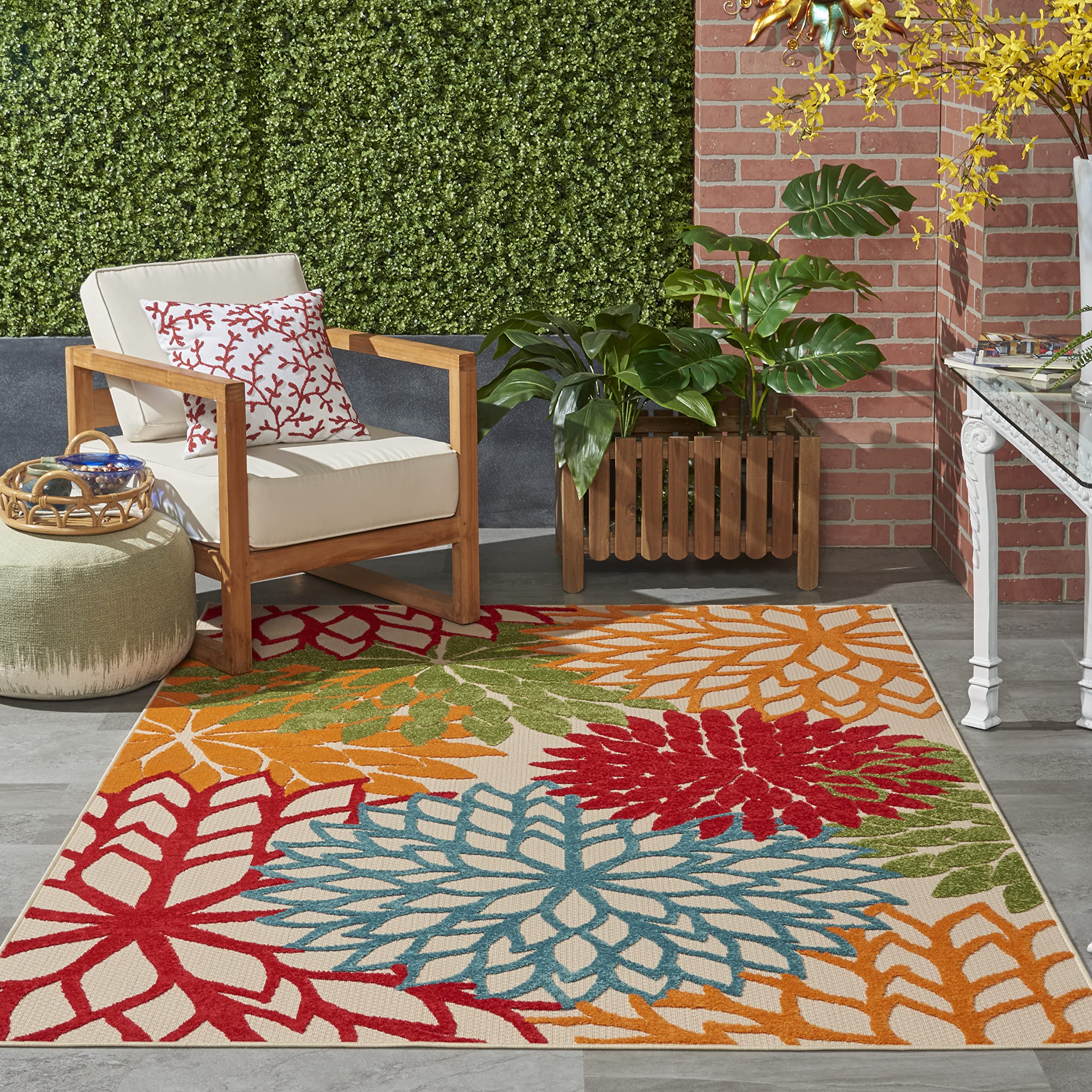 Nourison Aloha floral pattern green rug brightens outdoor spaces with tropical vibe.