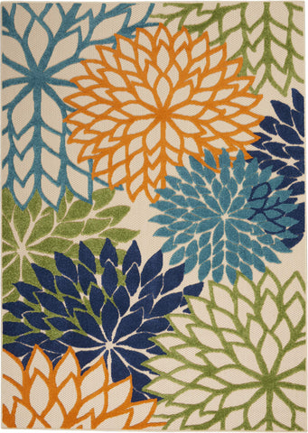 Nourison Aloha green floral rug adds tropical flair to outdoor areas.
