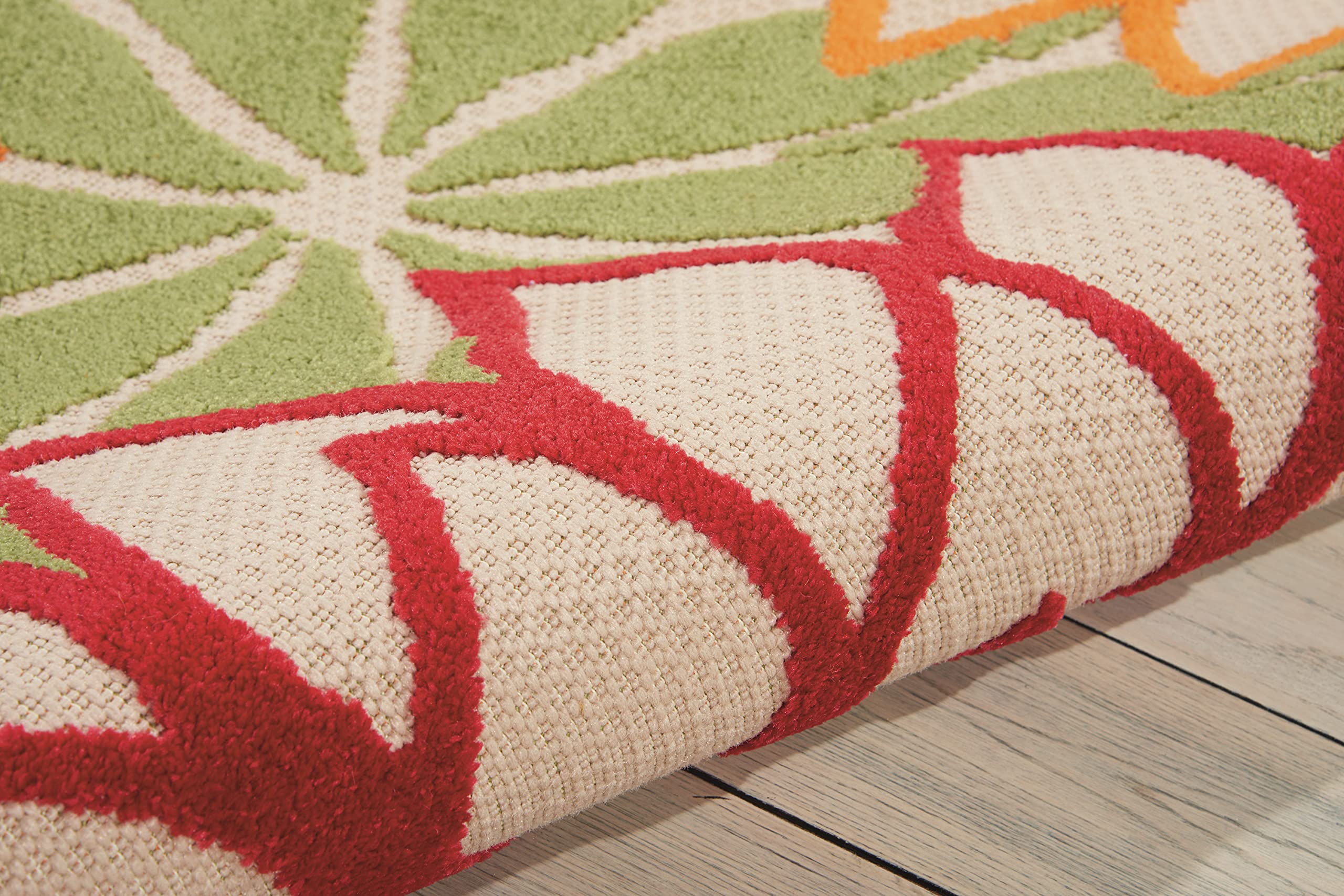 Nourison Aloha rug pad recommended to prevent slipping and protect floors.