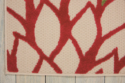 Nourison Aloha stain-resistant polypropylene rug is easy to clean after spills.