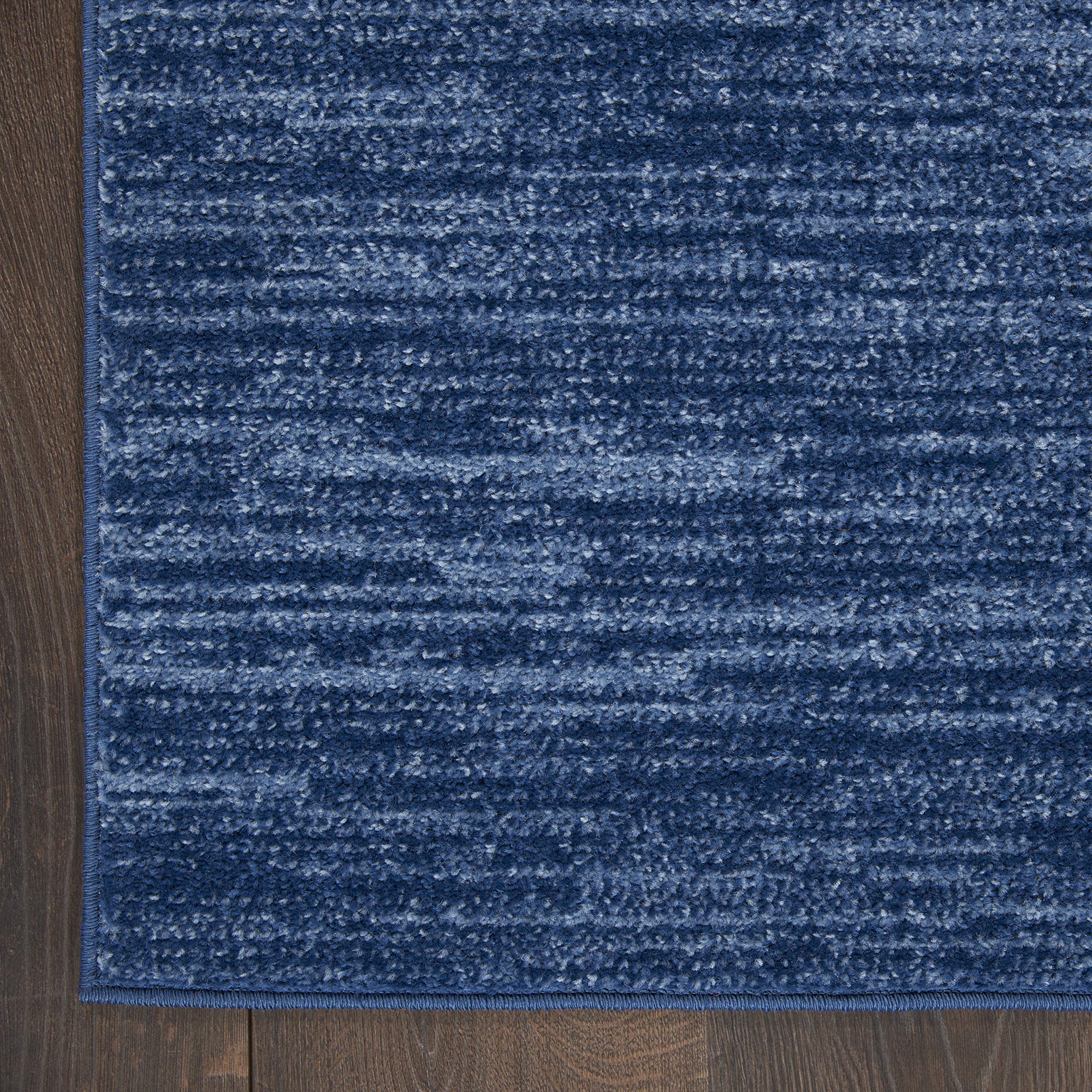 Nourison Essentials navy blue rug is easy to clean and maintain