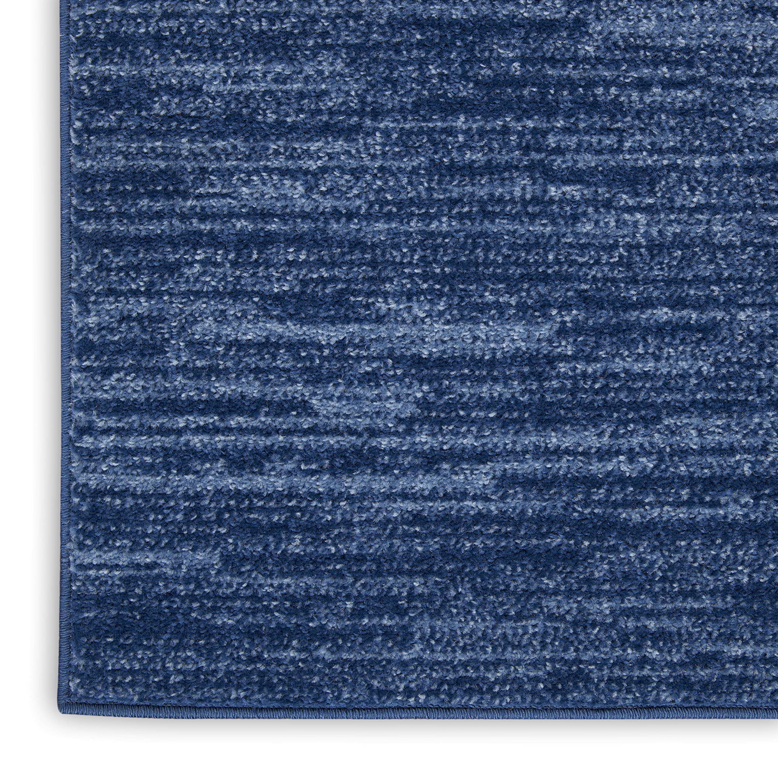 Nourison Essentials navy blue rug handles high traffic with comfort