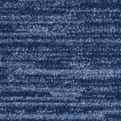 Nourison Essentials navy blue rug ready for layering with other textures