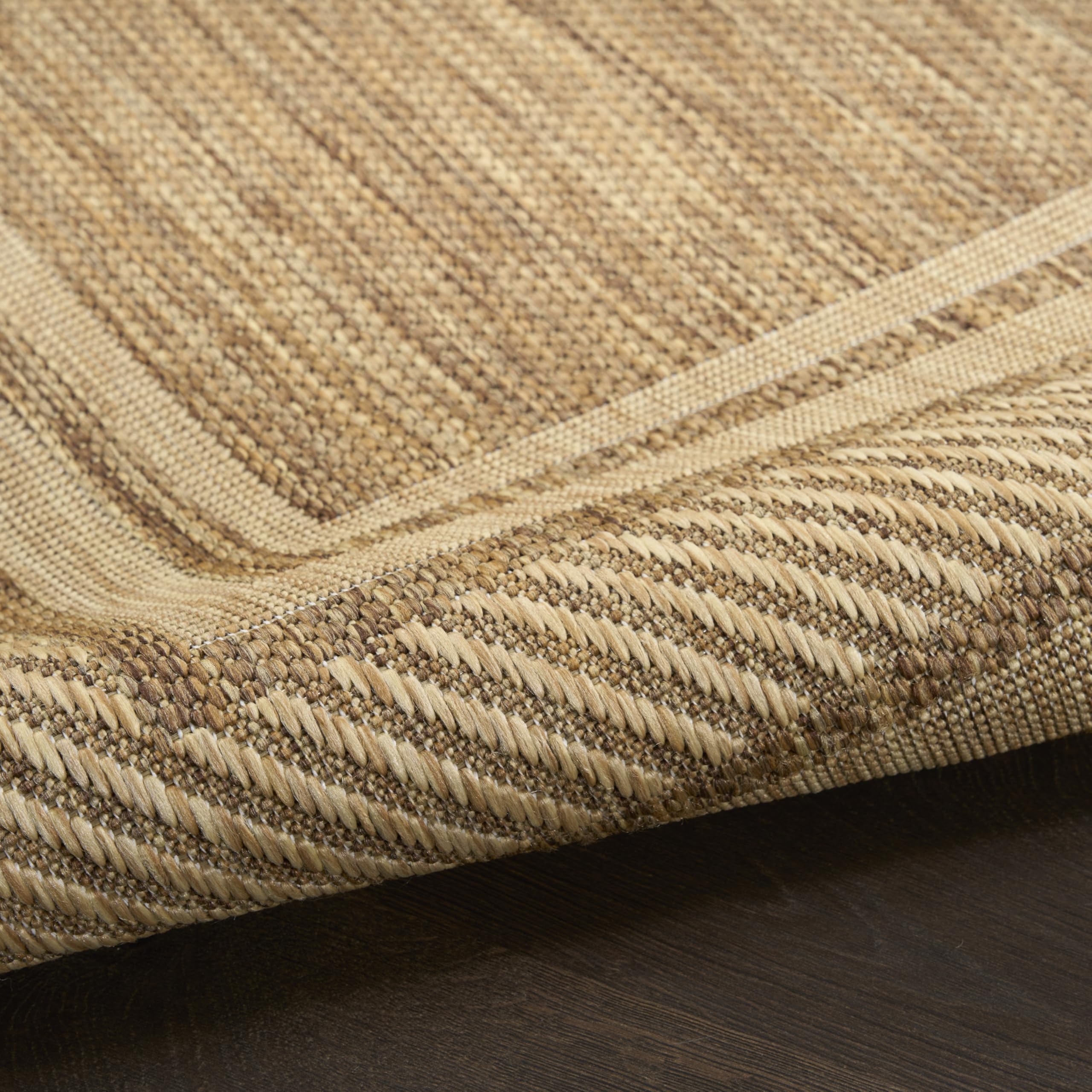 Nourison Home Horizon natural brown tones coordinate with outdoor furniture