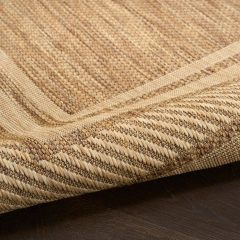 Nourison Home Horizon natural brown tones coordinate with outdoor furniture